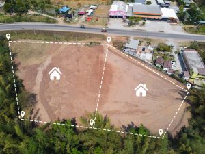 Vacant land management land reclamation for land plot for building house aerial view, land pins location for housing subdivision residential development owned sale rent buy or investment home expand.